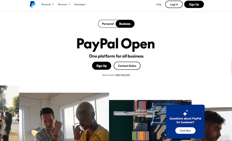 Website homepage featuring "PayPal Open" with options for "Personal" and "Business." Includes "Sign Up," "Contact Sales," and chat option.